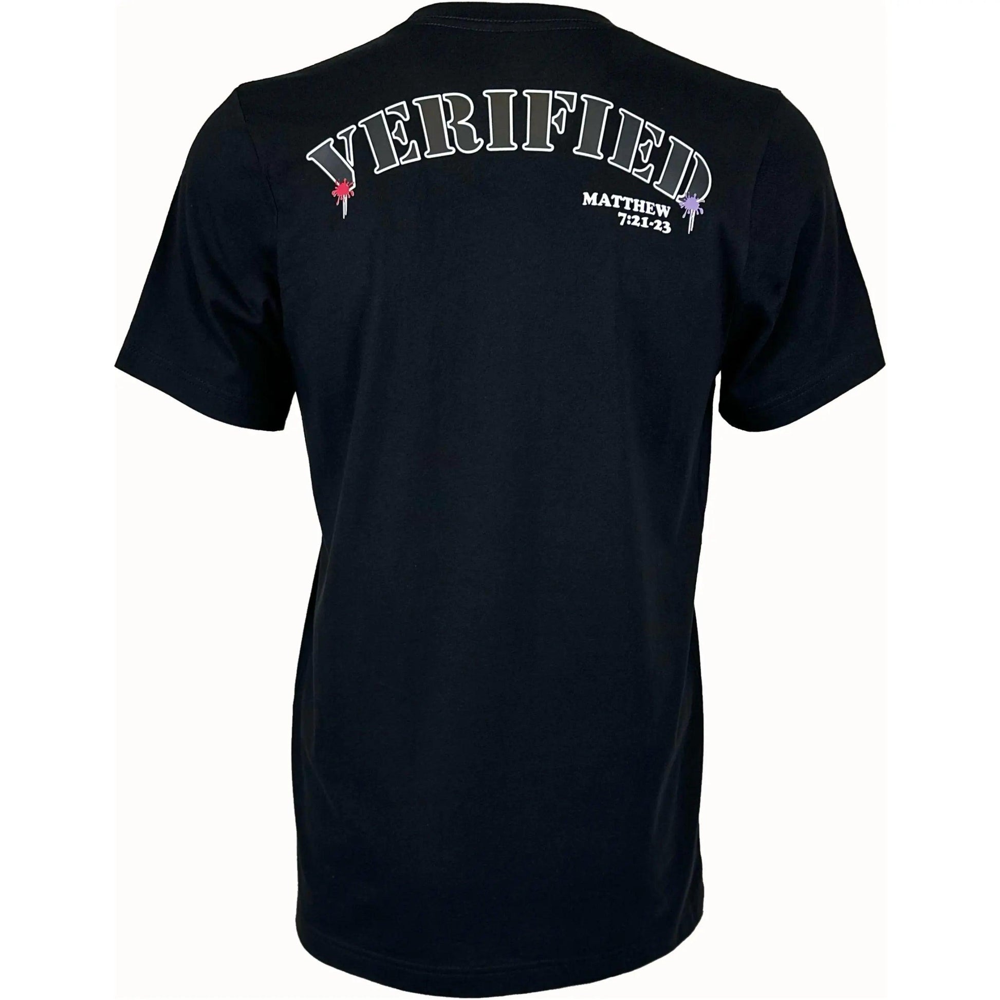 Christian clothing brand showing the back of a black unisex faith-based shirt. The word verified is written on back in white letters with two small pink and purple splats on each side. Faith inspired design using scripture from Matthew 7:21-23 which is written below the word verified.